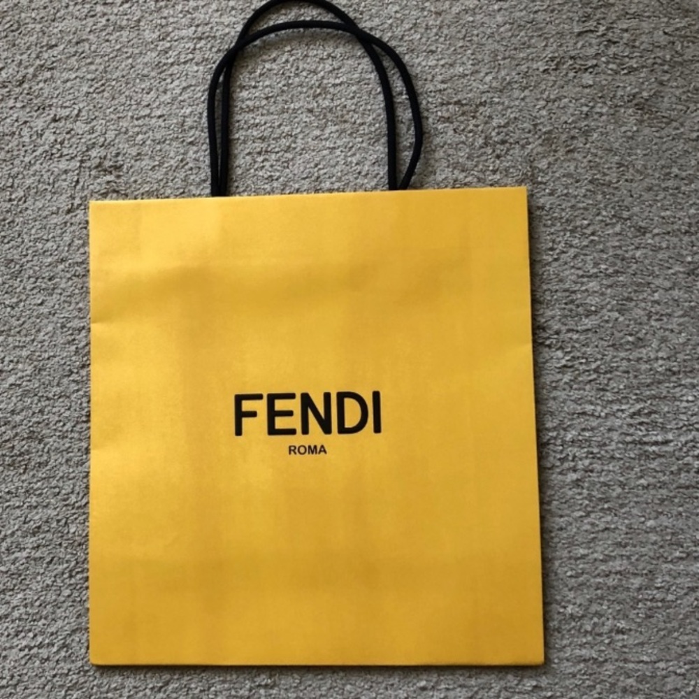 Authentic Fendi Paper Bag Yellow with black FENDI Logo.